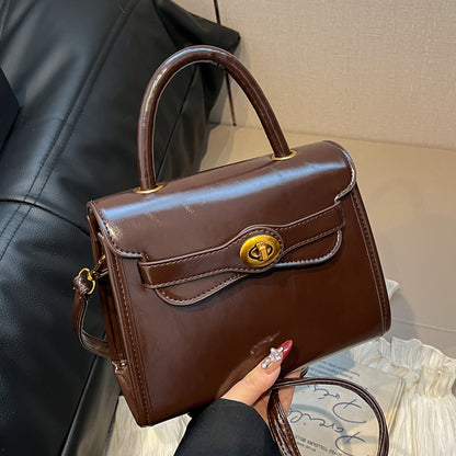 BINFENXIE 2025 Retro hand-carried small bag women's popular autumn and winter new portable small square bag high-end texture commuter versatile messenger bag